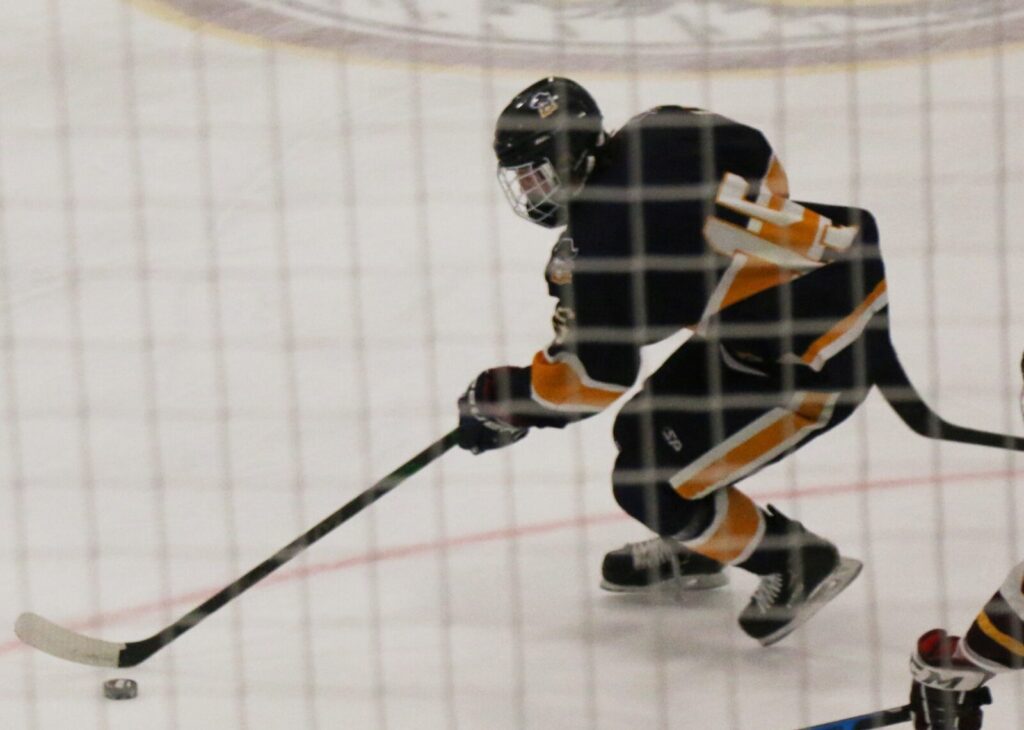 JACK DODA SCORES TWO GOALS TO LEAD PIRATE BOYS HOCKEY PAST LOW