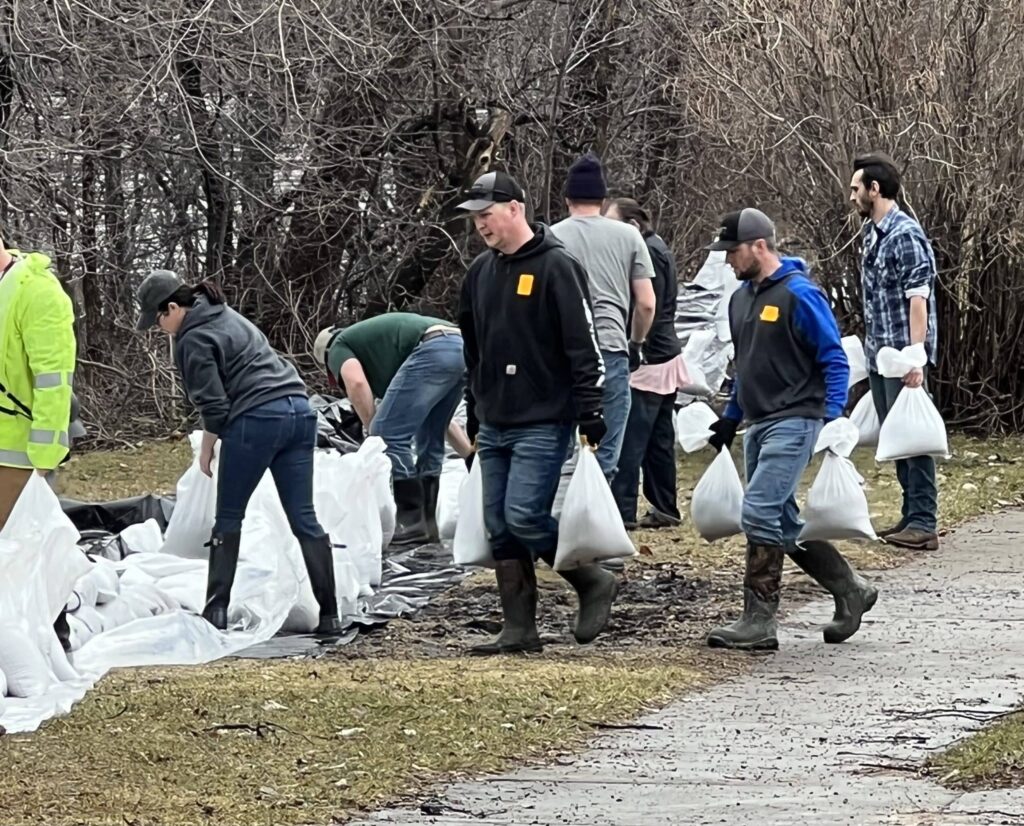 SEVERAL ROADS HAVE BEEN CLOSED AND SANDBAGGERS STILL NEEDED