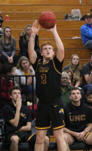 Ben Juhl shoots a three-pointer