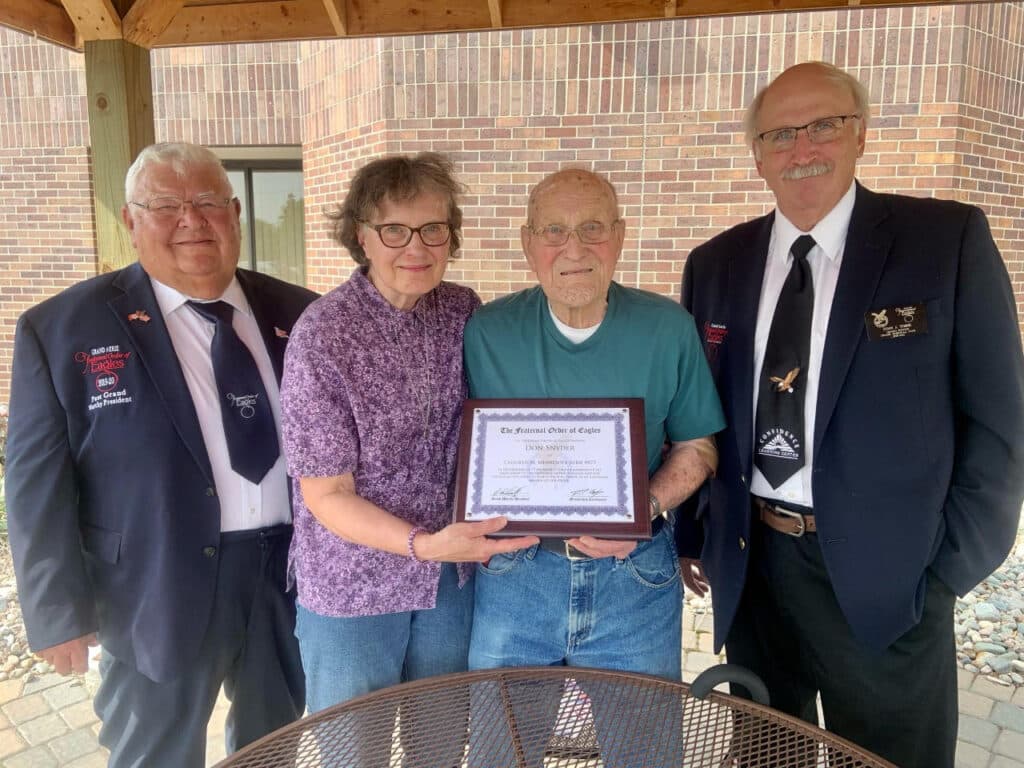 FRATERNAL ORDER OF EAGLES PRESENTS DON SYNDER WITH 77 YEAR OF MEMBERSHIP PLAQUE