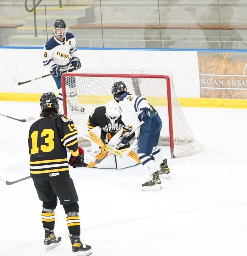 #2 WARROAD FLEXES MUSCLES ON CROOKSTON PIRATES BOY’S HOCKEY