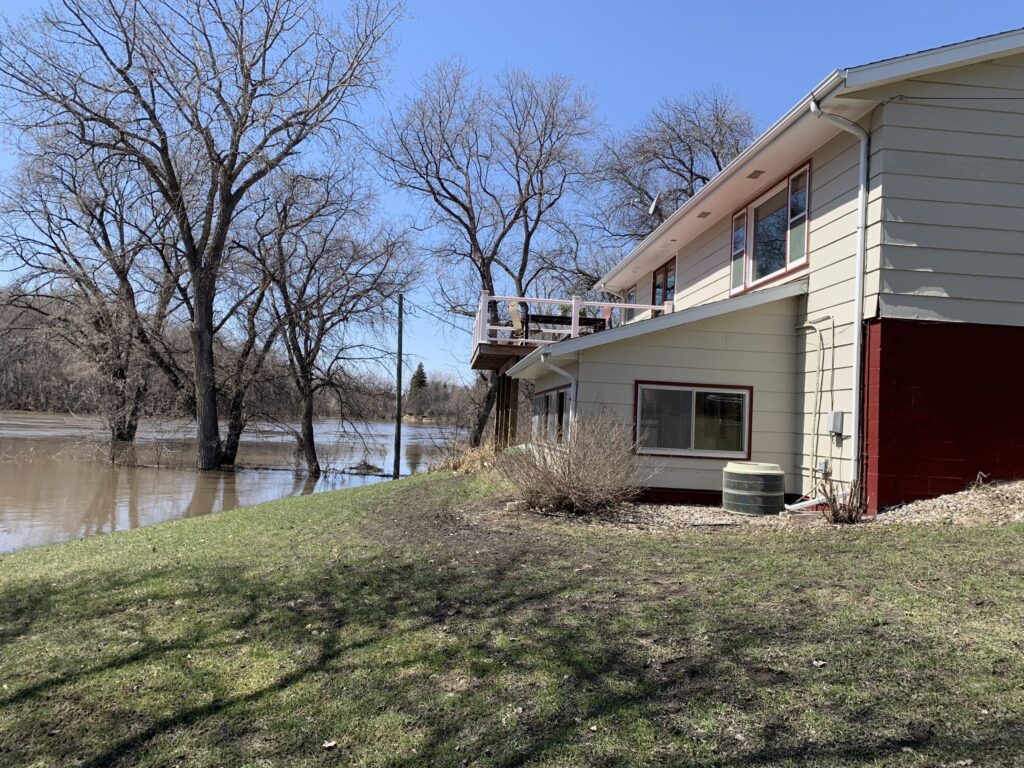 RIVER BACK ABOVE 20-FEET, EOC IN FULL OPERATION, SANDBAGGERS NEEDED AT 518 RIVERSIDE