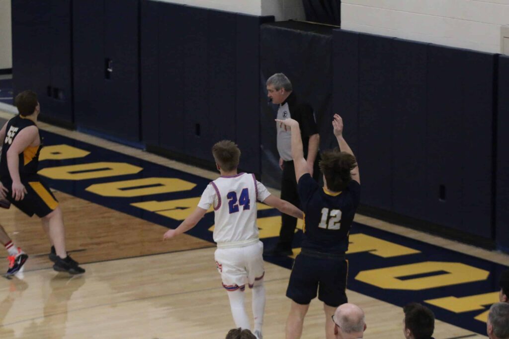 WIN-E-MAC ENDS EACH HALF WITH STRONG FINISHES TO DEFEAT CROOKSTON 77-61