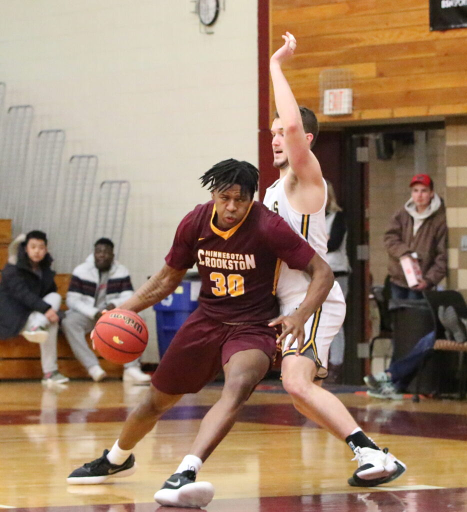 Josh Collins drives into the lane