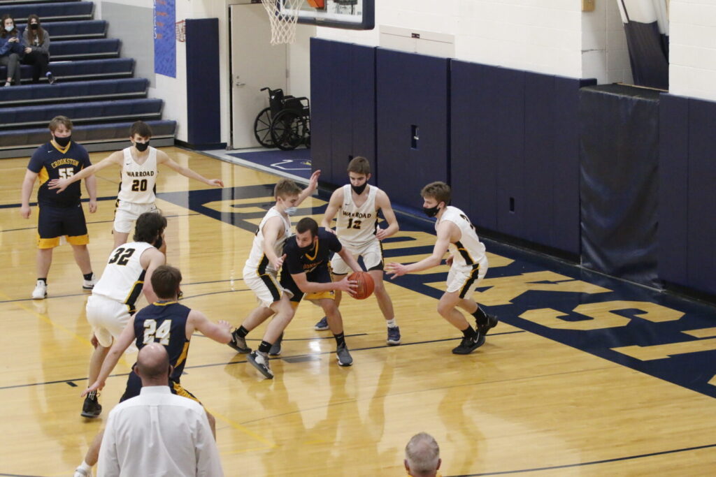 WARROAD PULLS AWAY TO BEAT PIRATE BOYS BASKETBALL