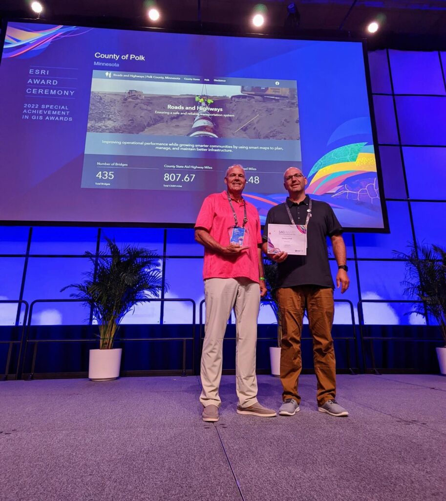 POLK COUNTY’S RICK THOMPSON AND NATHAN SMITH RECIEVE GIS AWARD AT INTERNATIONAL CONFERENCE