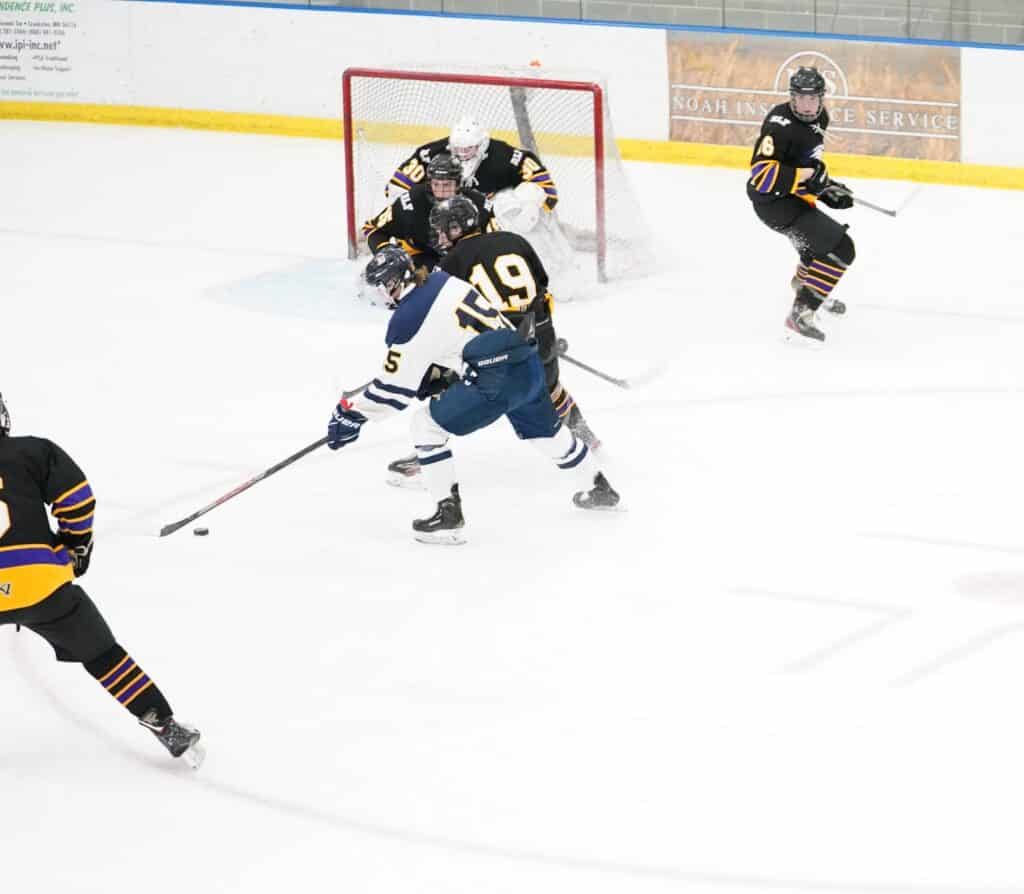RED LAKE FALLS USES HUGE SECOND PERIOD TO DEFEAT CROOKSTON