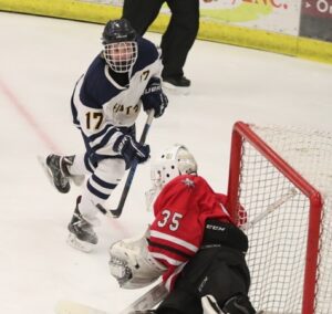 Eric Delorme with a pass