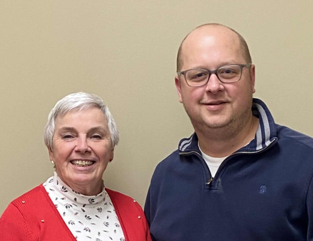 Fin n Fit Presents a check to Parks and Recreation for pool replacement part