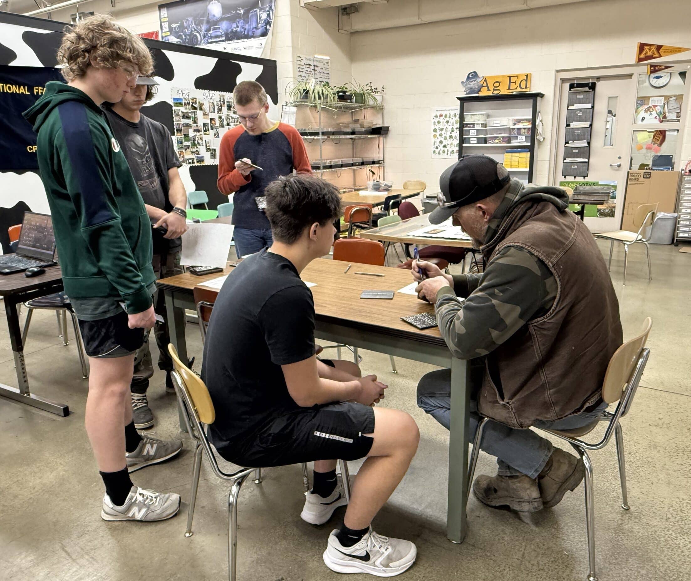 CHS welding students get critiqued by Certified Welder Tim Hegg of ICS