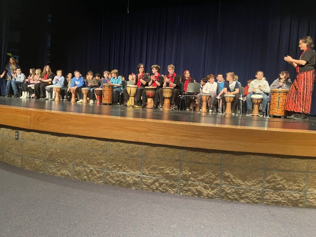 Dr. Kenyon Williams gets Highland 5th graders excited about percussion