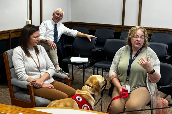 Polk County Commissioners meet a new service dog, and get an update on bank switch-over issues with checks sent out