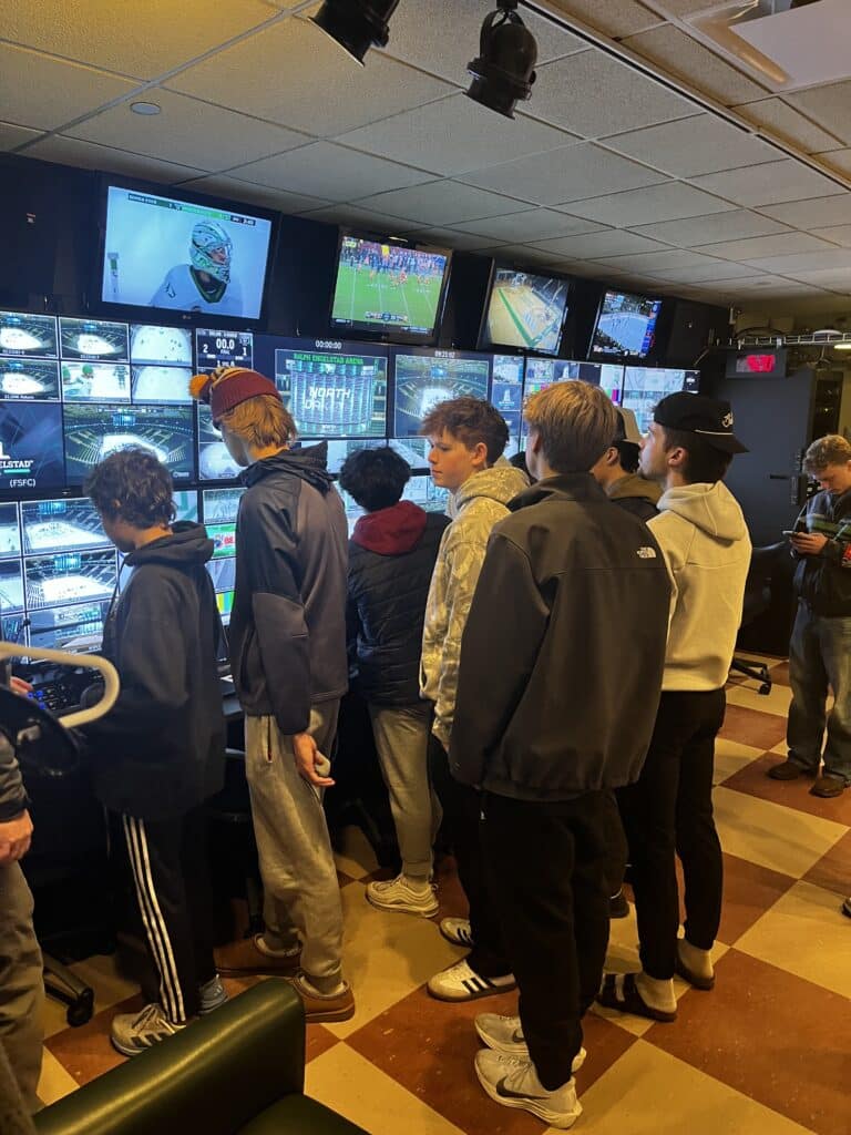 20 Crookston High School Students tour the Ralph Englestad and learn more about the Daktronics software