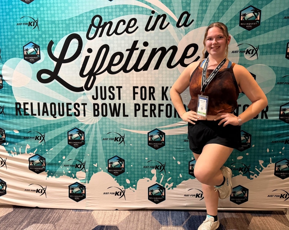 Miss Crookston 2025 Hayley Leckie performs at ReliaQuest Bowl as part of Just For Kix performance