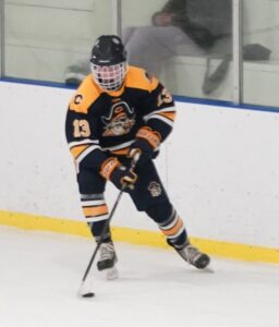 Pirate Boys Hockey takes down RLF in season finale, coach Hardy records 100th win