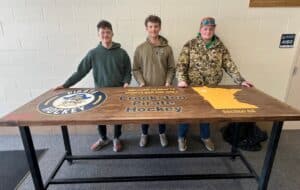 Crookston High School Community Projects class completes a high top table for Drafts Sports Bar and Grill.