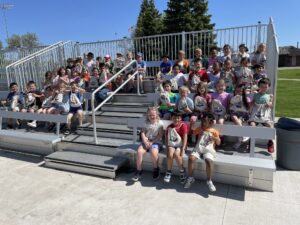 Highland first graders celebrate reading performance in May with Get Kids Outdoors nature day