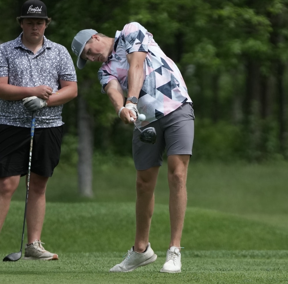 Garrett Fischer competes in day one of the State Golf Tournament