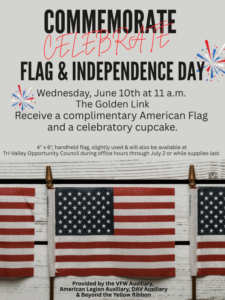 Local veteran groups join together to give away handheld flags ahead of Flag Day and Fourth of July celebrations