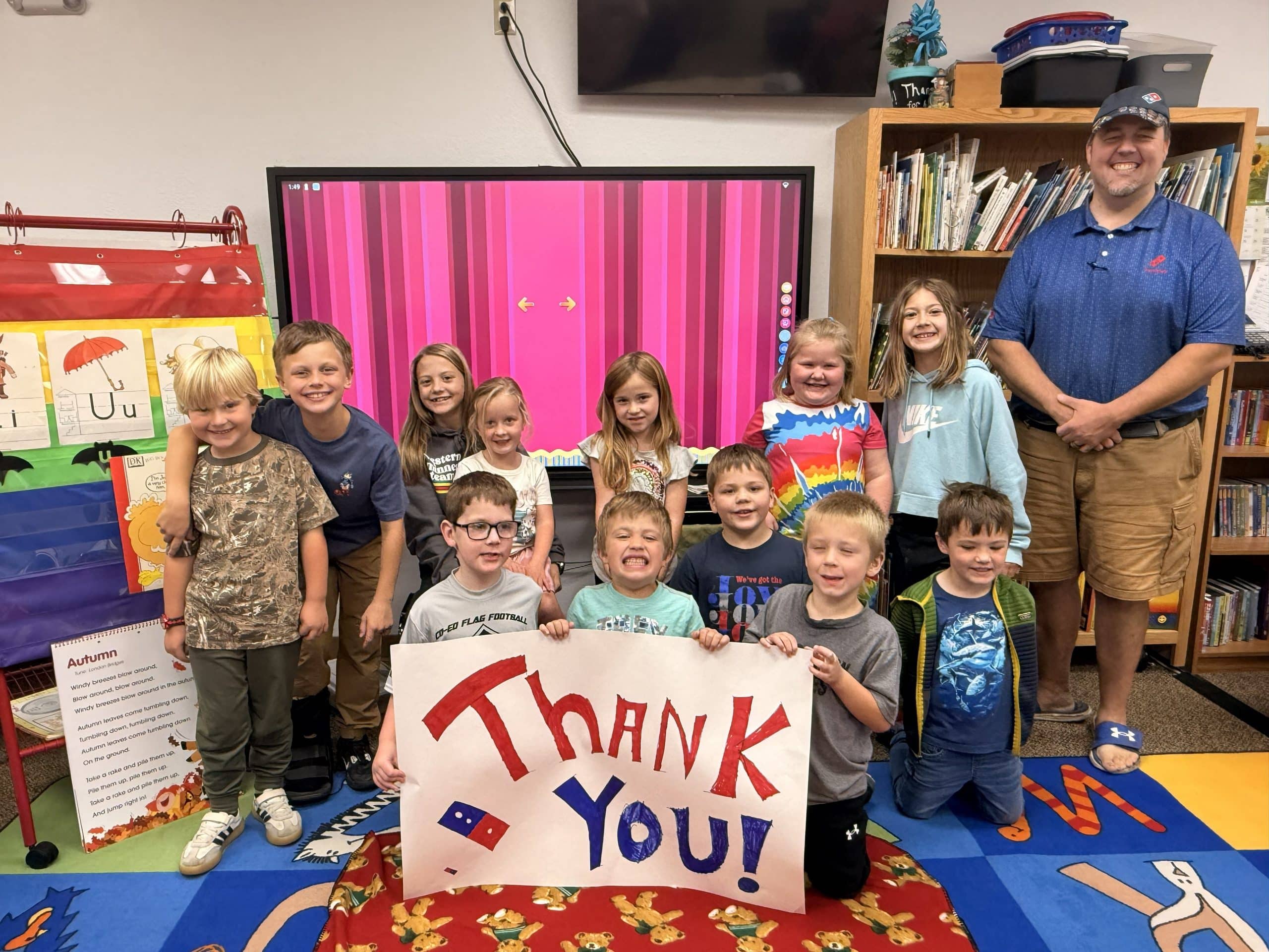 Our Savior’s Lutheran School receives fundraiser money from Domino’s Pizza