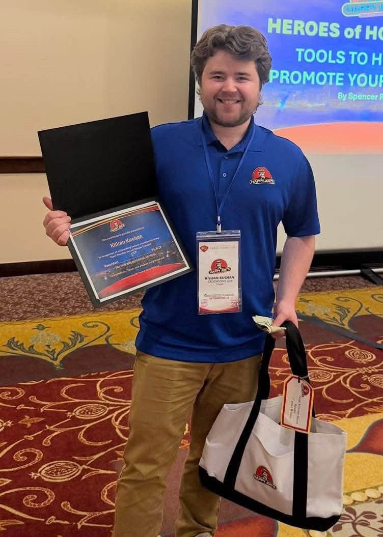 Crookston’s Killian Kuchan wins first place in the Secret Recipe contest at the Happy Joe’s National Franchise Convention